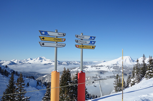 Direction signs on the ski slopes in the Portes du Soleil ski area of the French Alps.