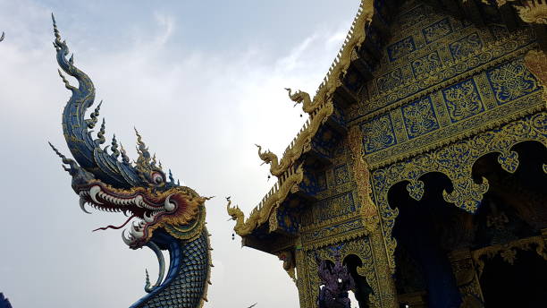 istock Dragon head statue at Blue temple Thailand. 1055567702