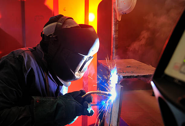 welding with mig-mag method. welding with mig-mag method on shipyard field welding photos stock pictures, royalty-free photos & images