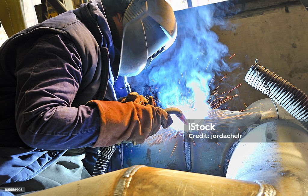 Cutting metal  with plasma equipment Cutting metal  with plasma equipment inside of factory Burning Stock Photo