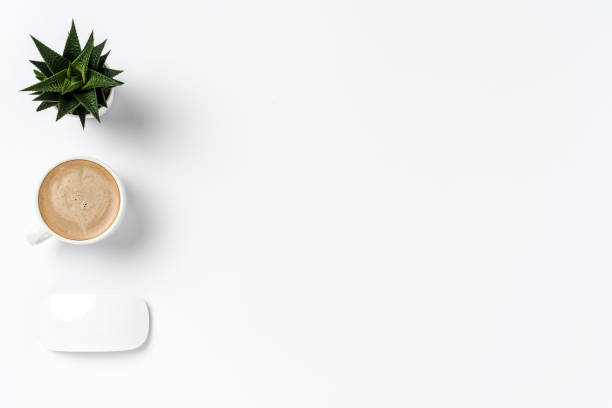 istock Overhead shot of office desktop 1055570850