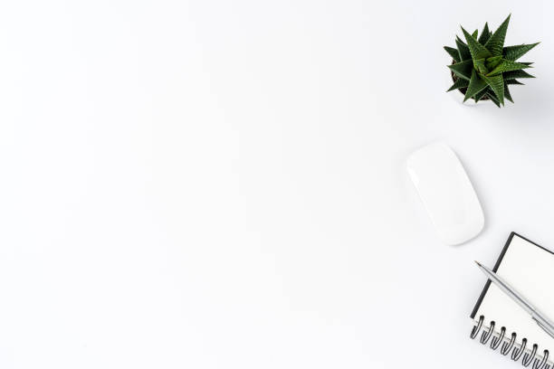istock Overhead shot of office desktop 1055571392