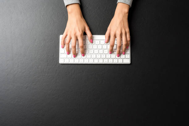 istock Overhead shot of office desktop 1055571590