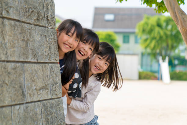 Group of young friends playing together. Okayama, Japan.