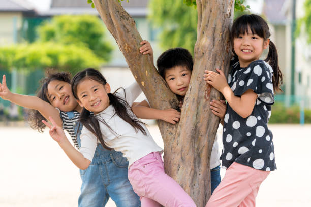 istock Group of young friends playing together 1055577188
