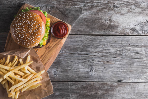 istock fast food on the wood 1055578062