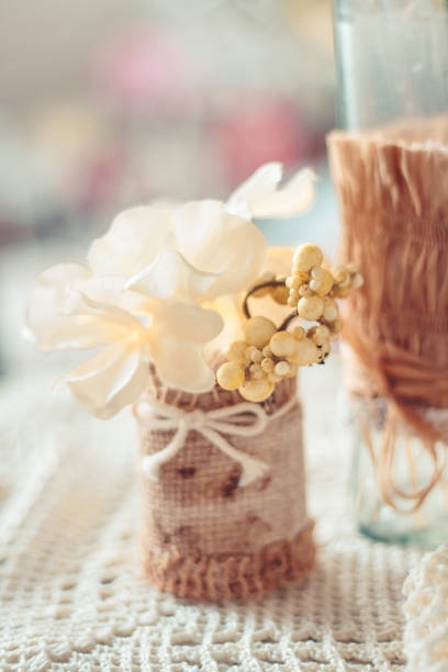 istock Delicate composition with flowers in a vase 1055579936