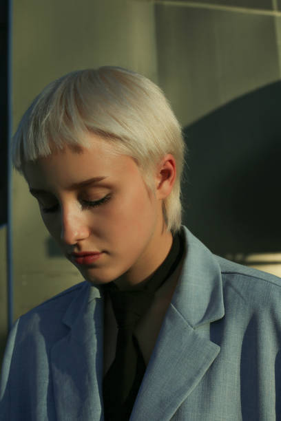 istock serious calm young woman with extraordinary appearance 1055582770