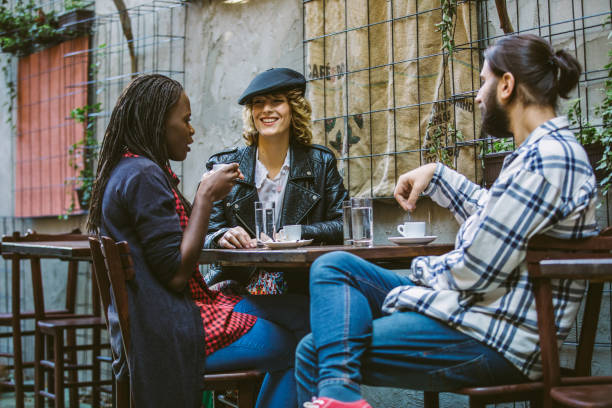 istock Happy Friends On Coffee Break 1055586804