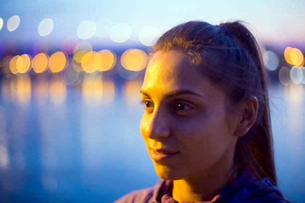 istock Young woman at night 1055587094