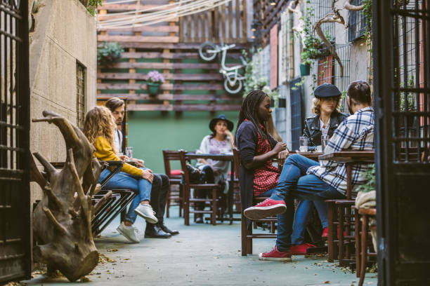istock Regular Morning at Sunny Sidewalk Cafe 1055587314