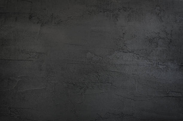 темно-серый и черный текстурный бетонный фон - stucco wall textured textured effect стоковые фото и изображения