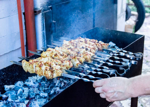 istock BBQ meat. Grill outdoors. barbecue grill delicions 1055589856
