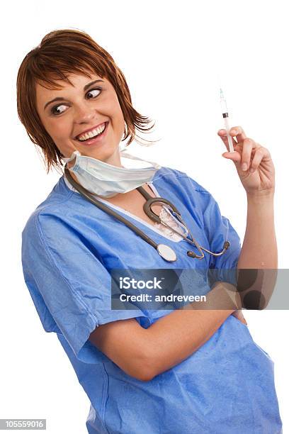 Mad Scientist Holding Filled Syringe Stock Photo - Download Image Now - 20-29 Years, Adult, Beautiful People