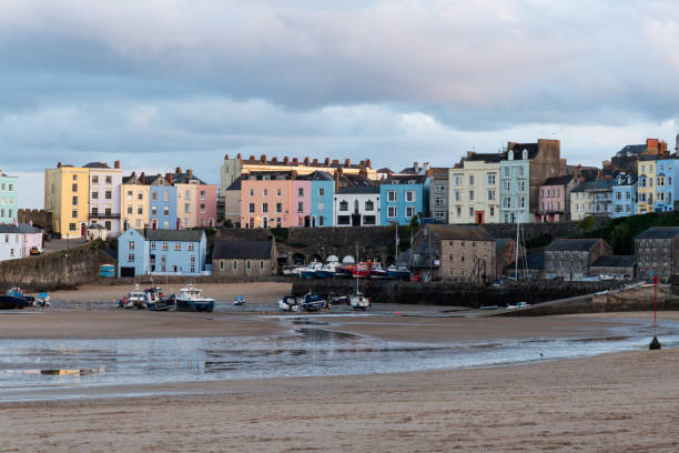 istock Tenby Colourful Houses and harbour at Sunset 1055590482