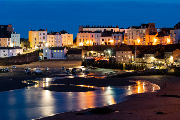 istock Tenby Beach and harbour at Night 1055590506