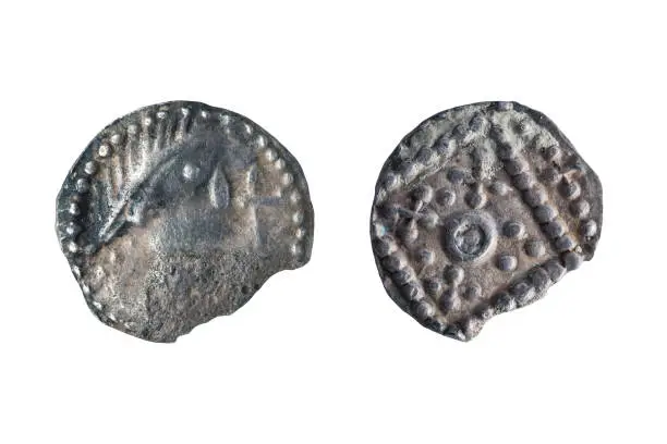 Anglo Saxon silver Sceat coin front and reverse sides of the early 8th century cut out and isolated on a white background