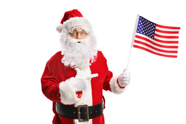 istock Santa Claus with an American flag pointing 1055596856