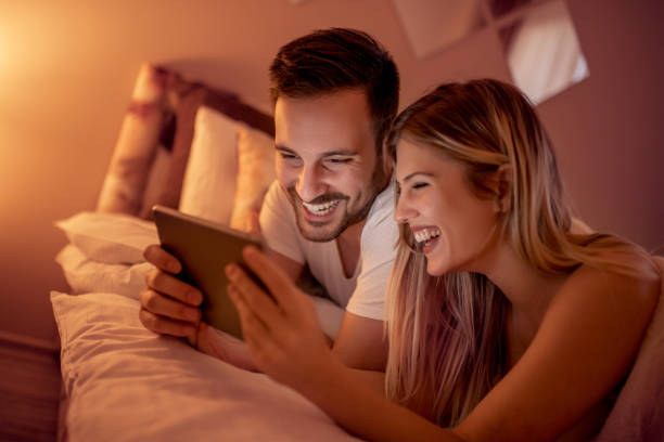 istock Young couple enjoying at home 1055597366