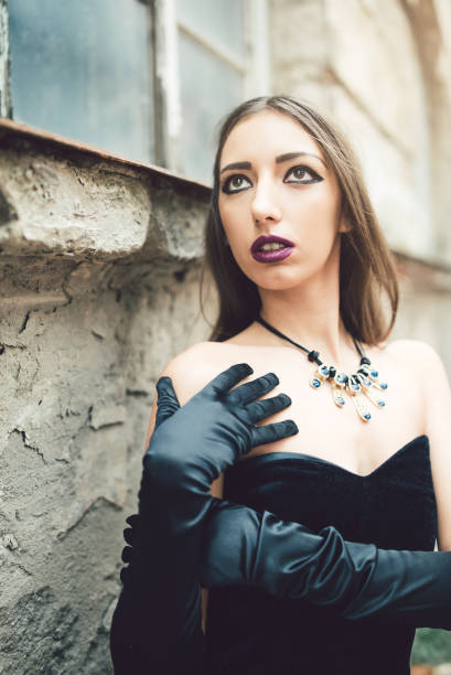 istock Glamour goth girl posing 1055598408