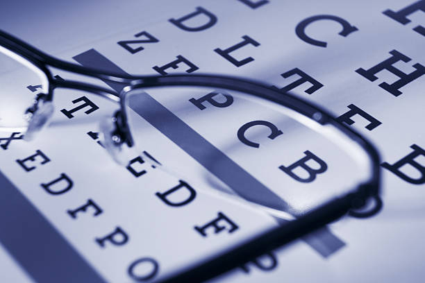 Snellen chart and spectacles stock photo