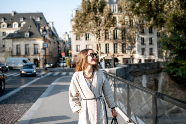 istock Woman walking in Paris 1055602678