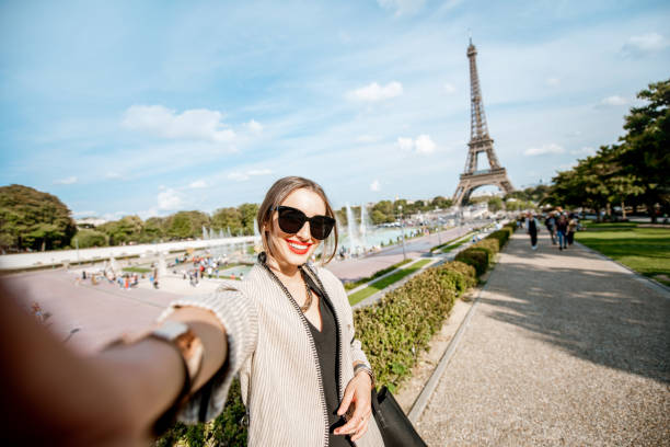 istock Woman portrait near the Eiffel tower 1055603234