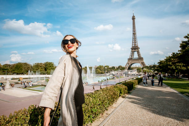 istock Woman portrait near the Eiffel tower 1055603276