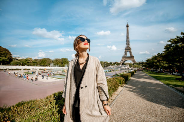 istock Woman portrait near the Eiffel tower 1055603278