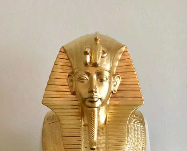 Close-up of gold Egyptian Sphinx - interior house decoration.