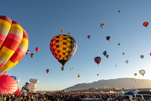 Hot Air Balloon Festival in Albuquerque. Photo taken during a cold October morning when there are hundreds of balloons ascending shortly after dawn.