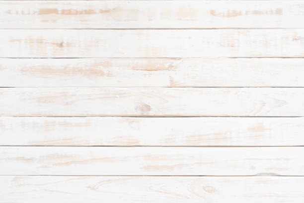 istock Top view of white wood texture background, wooden table. 1055608054
