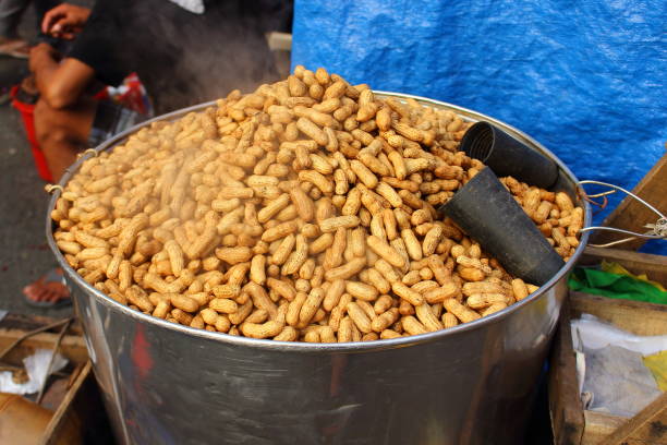 istock Bowl of peanuts on street 1055617710