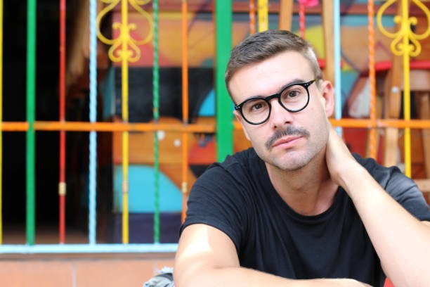 istock Man with mustache and eyeglasses 1055619438