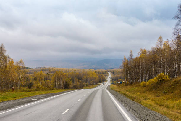 istock autumn view of the highway from the cab 1055623084