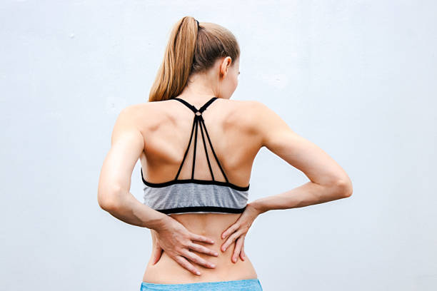 istock Athletic beautiful woman. Back view. 1055623328