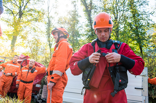 Firefighters in a rescue operation; all logos removed. Slovenia, Europe. Nikon.