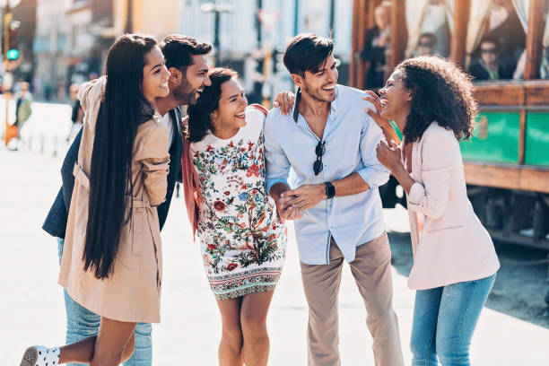istock Happy friends outdoors in the city 1055628620