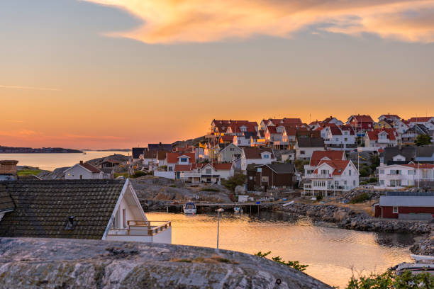 istock Swedish Island Homes in sunset 1055628946