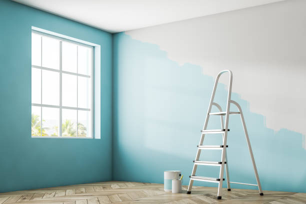 istock Corner of a room with half painted wall 1055640508
