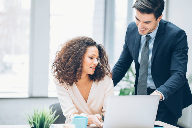 istock Business couple work meeting 1055642508