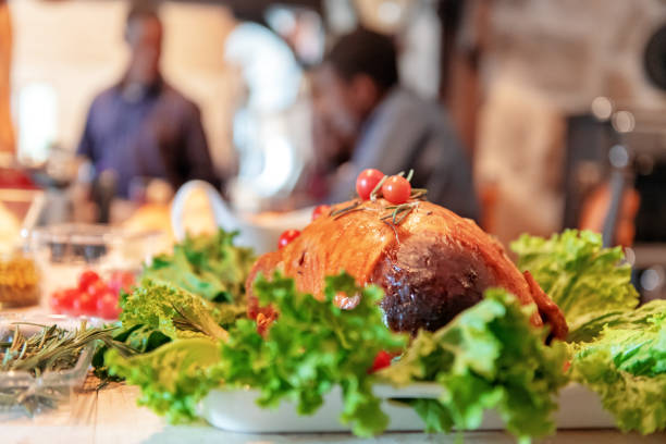 istock African-American preparing thanksgiving dinner 1055643150