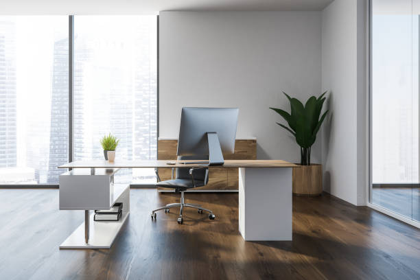 istock White wall manager office interior, corporation 1055645796