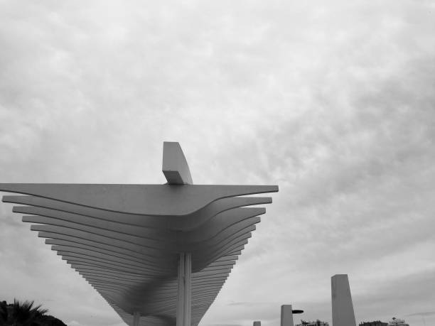 Modern architecture at Malaga Port Photo of an incredible moody sky with clouds in the Port of Malaga, Spain. innovación stock pictures, royalty-free photos & images
