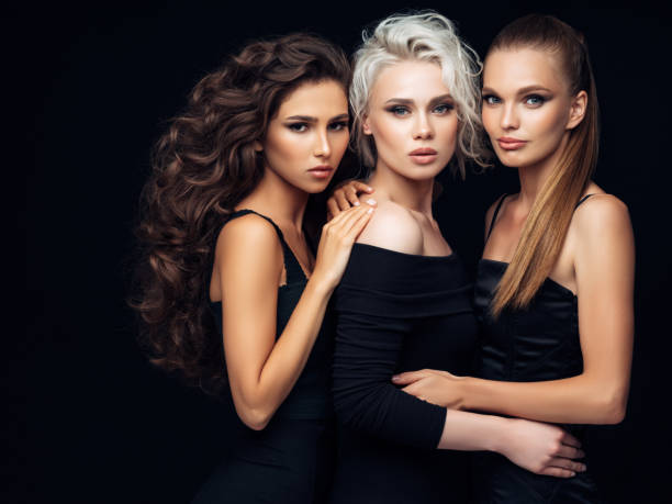 istock Three beautiful girls with a natural make-up 1055650214