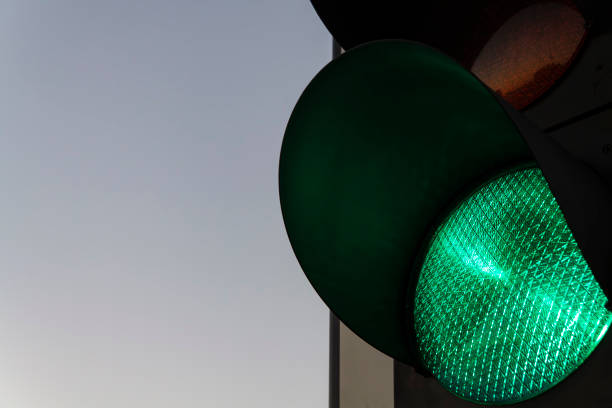 istock Traffic lights – green. Traffic lights with the green light lit. 1055656042
