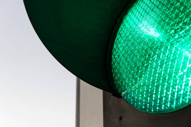 istock Traffic lights – green. Traffic lights with the green light lit. 1055656048