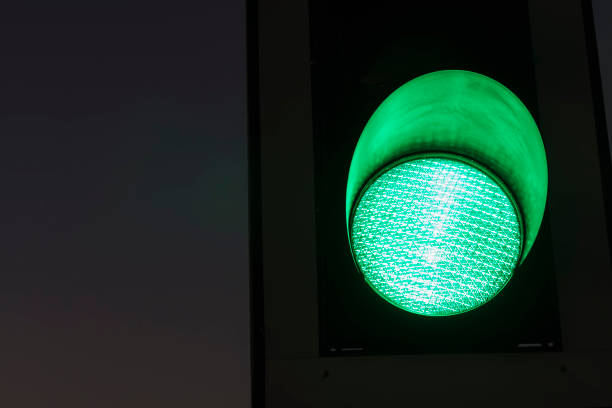 istock Traffic lights – green. Traffic lights with the green light lit. 1055656256