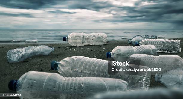 Plastic Water Bottles Pollution In Ocean Stock Photo - Download Image Now