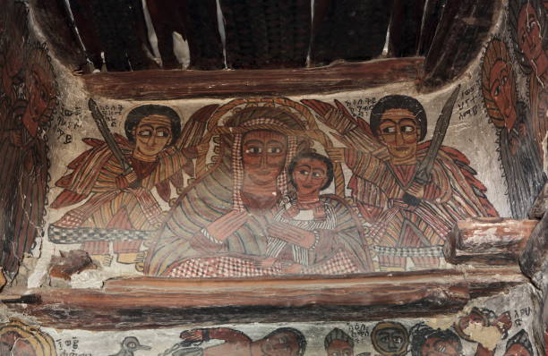 wall murals of saints and iconographic scenes on walls of Petros we Paulos church wall murals of saints and iconographic scenes, painted in naive african christian style, on wall of Petros we Paulos church - Tigray region of Ethiopia ethiopian orthodox church stock pictures, royalty-free photos & images
